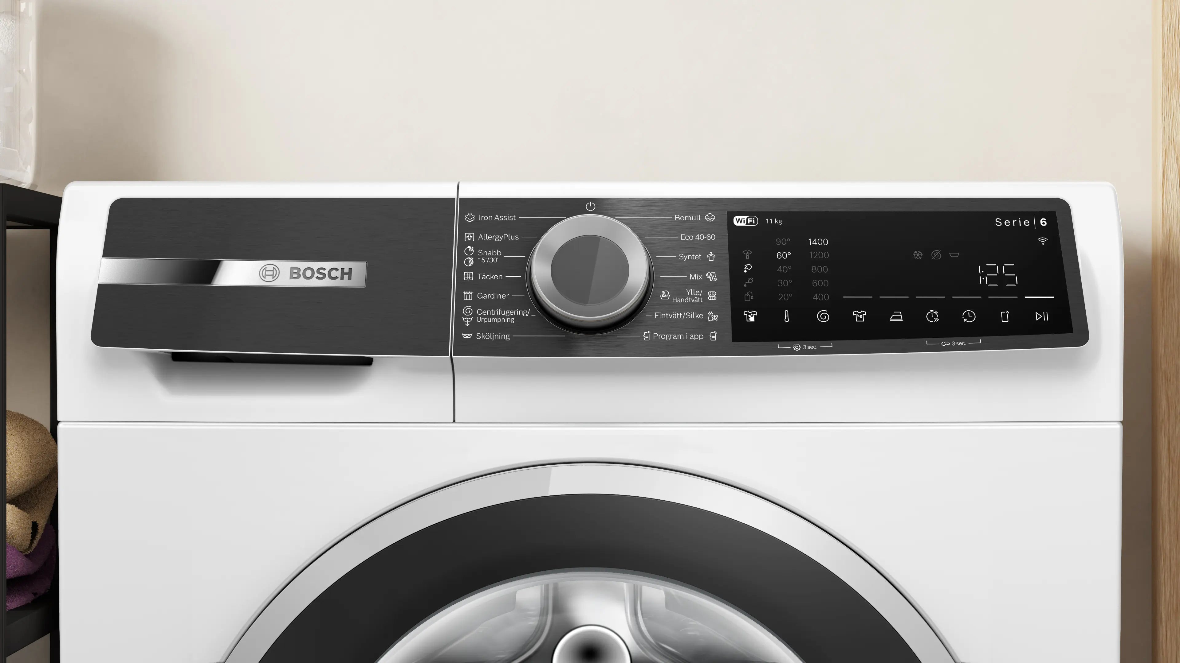 Zoomet ind på kontrolpanelet fra Bosch WGK264ZLSN vaskemaskine - 11 kg