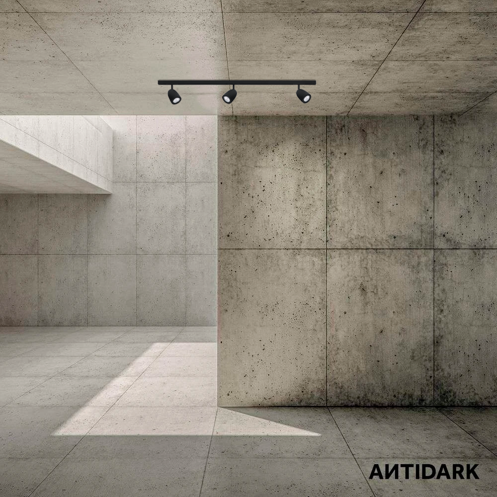 Designline Klokkesæt i loft i en morderne betonbygning