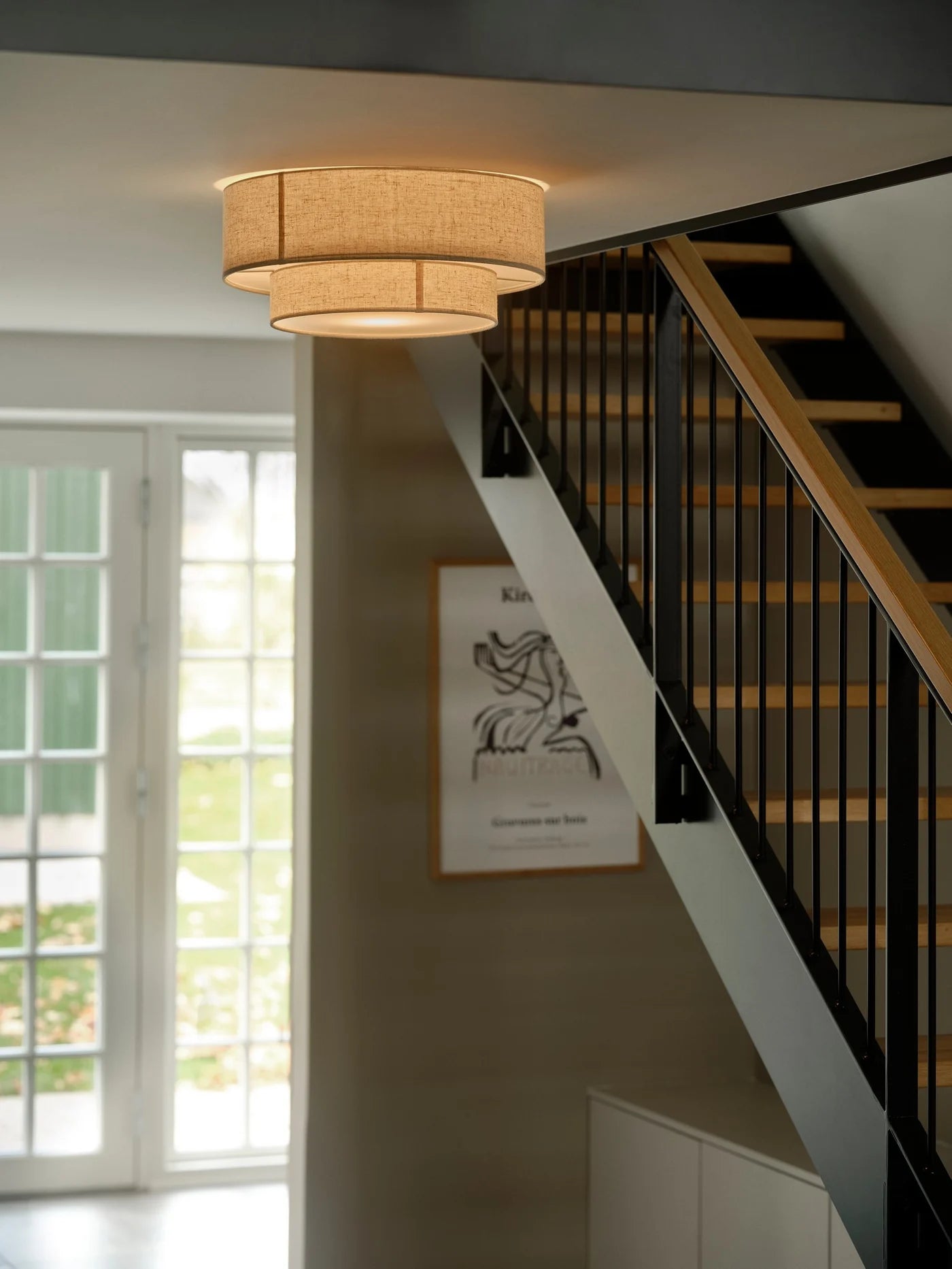 Nordlux Malodin Ceiling Light i Beige hængt op i gangen
