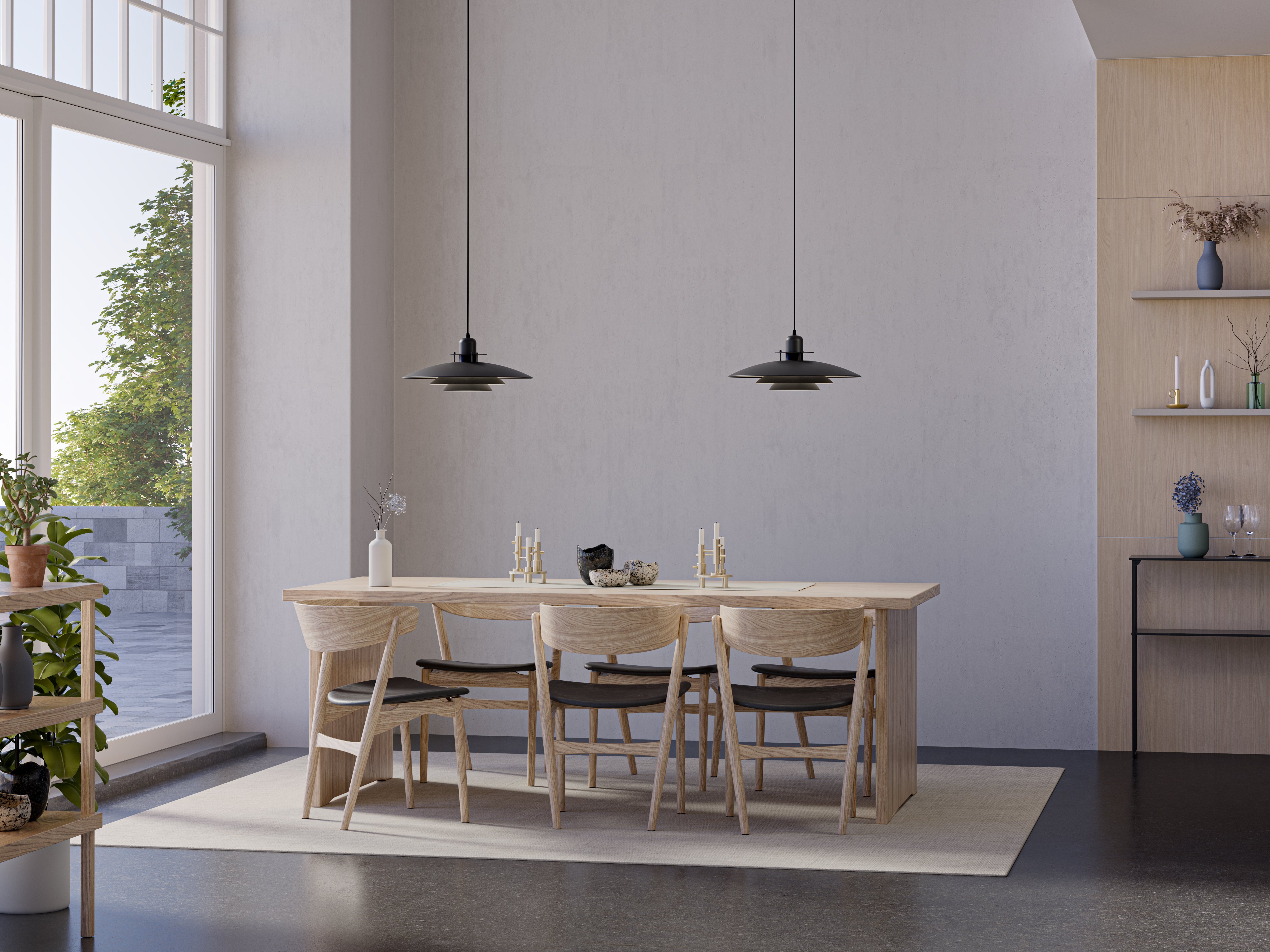 Belid Primus V Pendel i Mat Sort ophængt over spisebordet