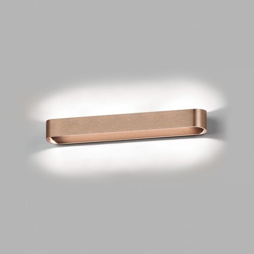 Light Point Aura W3 væglampe i rosegold på hvid væg