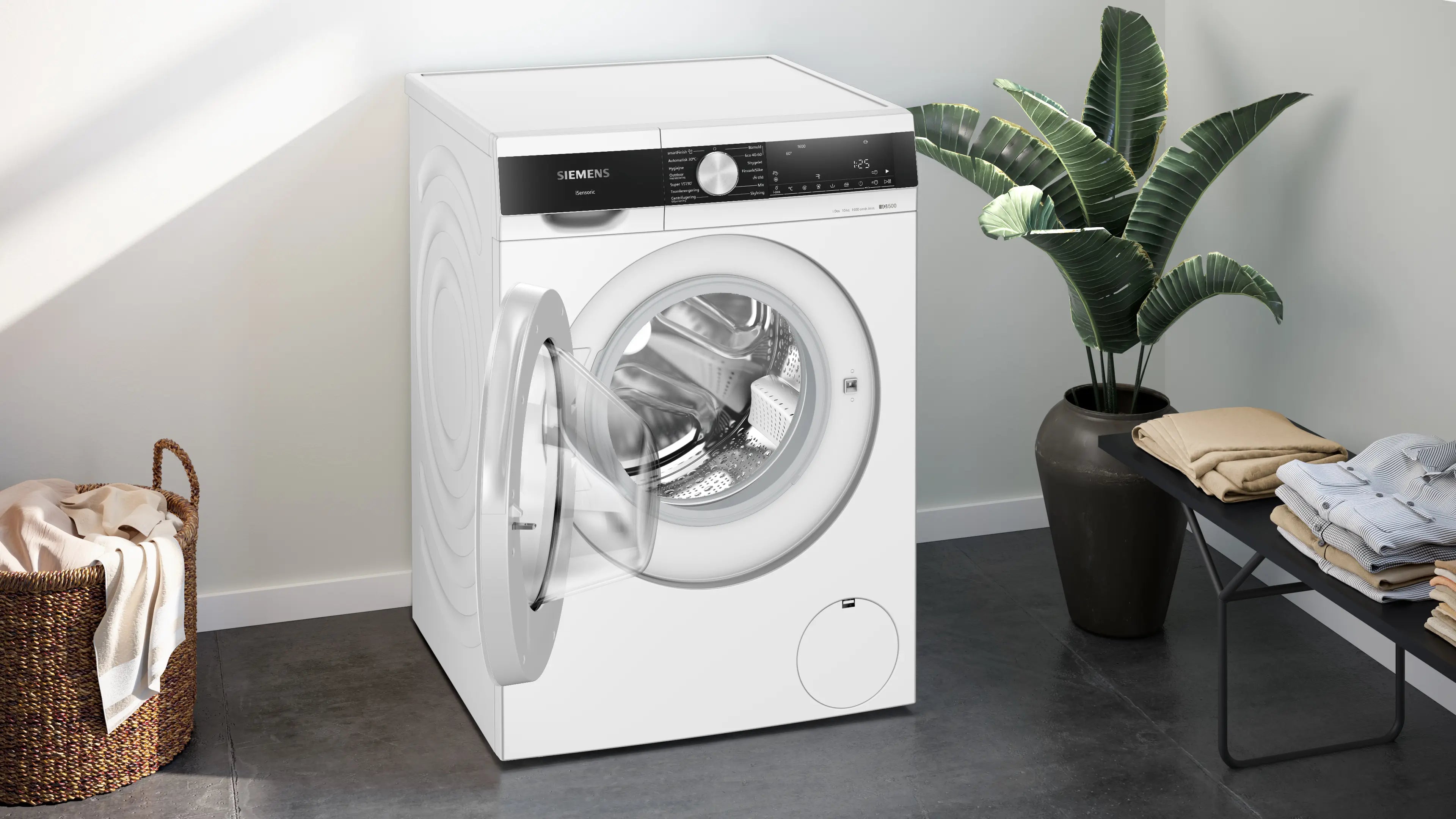 Siemens WG56G2FEDN iQ500 vaskemaskine placeret i vaskerummet