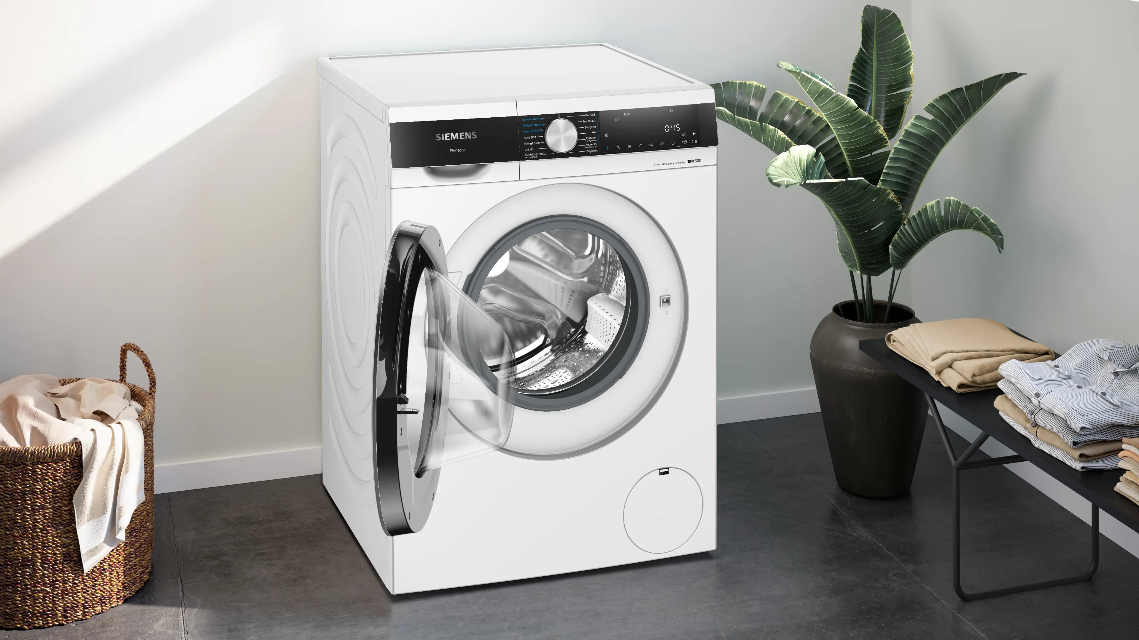 Siemens WN54G2A0DN iQ500 vaske-tørremaskine placeret i nyt moderne bryggers