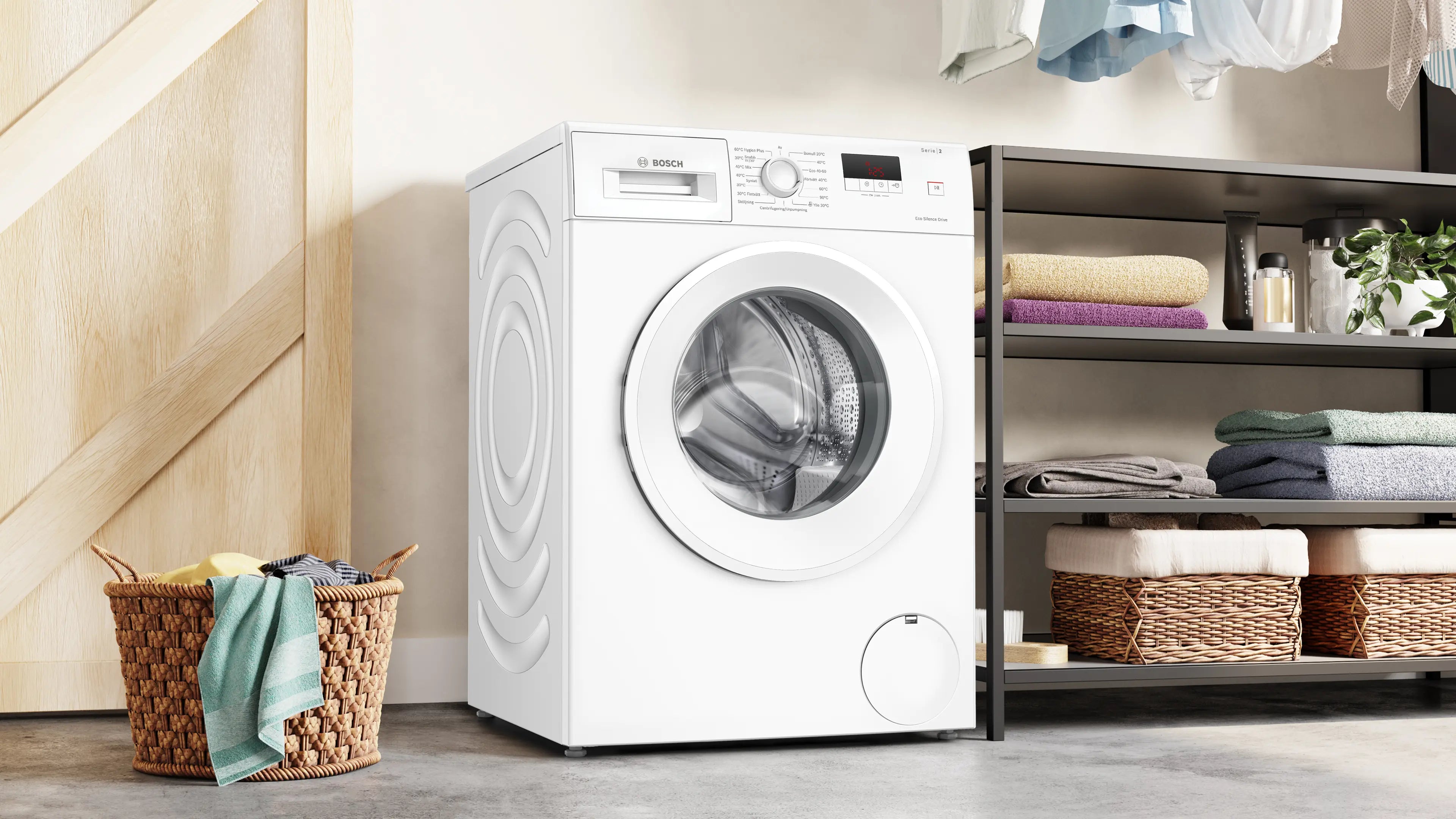 Den unikke designet Bosch WGE03200SN vaskemaskine - 8 kg placeret i vaskerummet