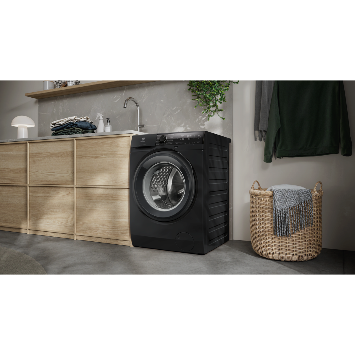Den unikke designet Electrolux EFI742RX4G vaskemaskine med 10,5 kg placeret i vaskerummet
