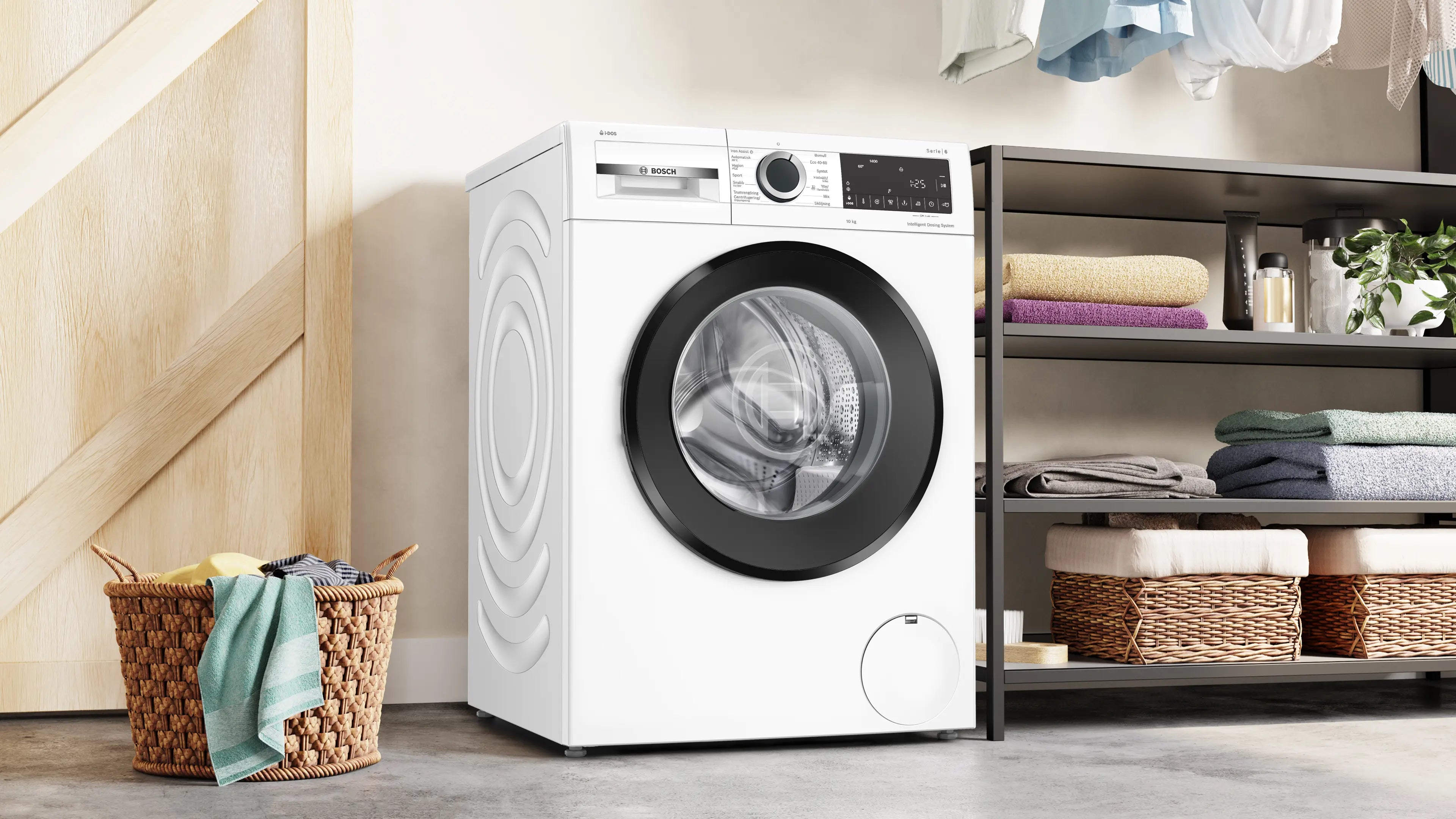 Den elegante Bosch WGG254FQSN vaskemaskine - 10 kg placeret i vaskerummet
