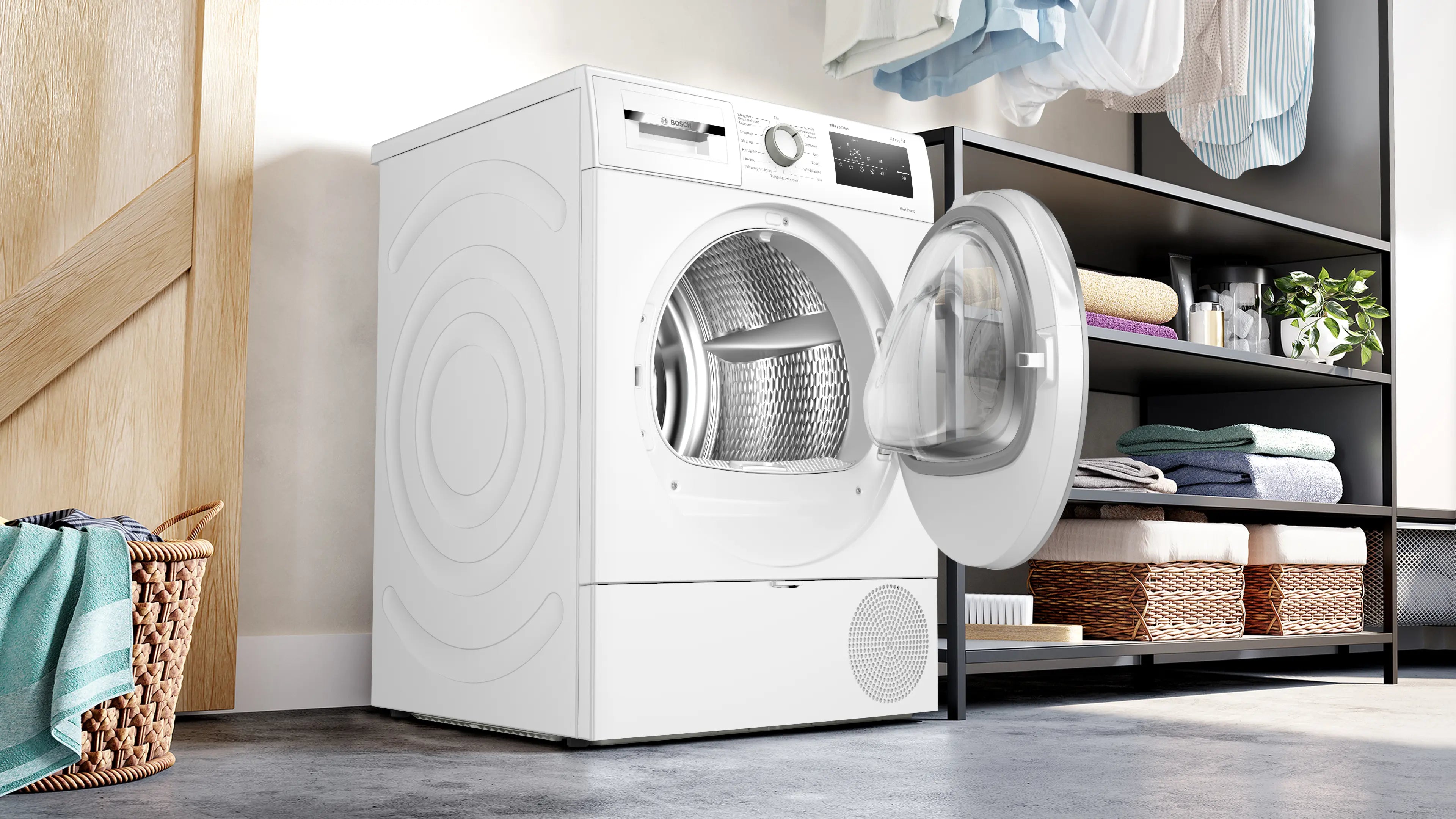 Den elegante designet Bosch WTH85V01DN tørretumbler med varmepumpe 8 kg placeret i vaskerummet
