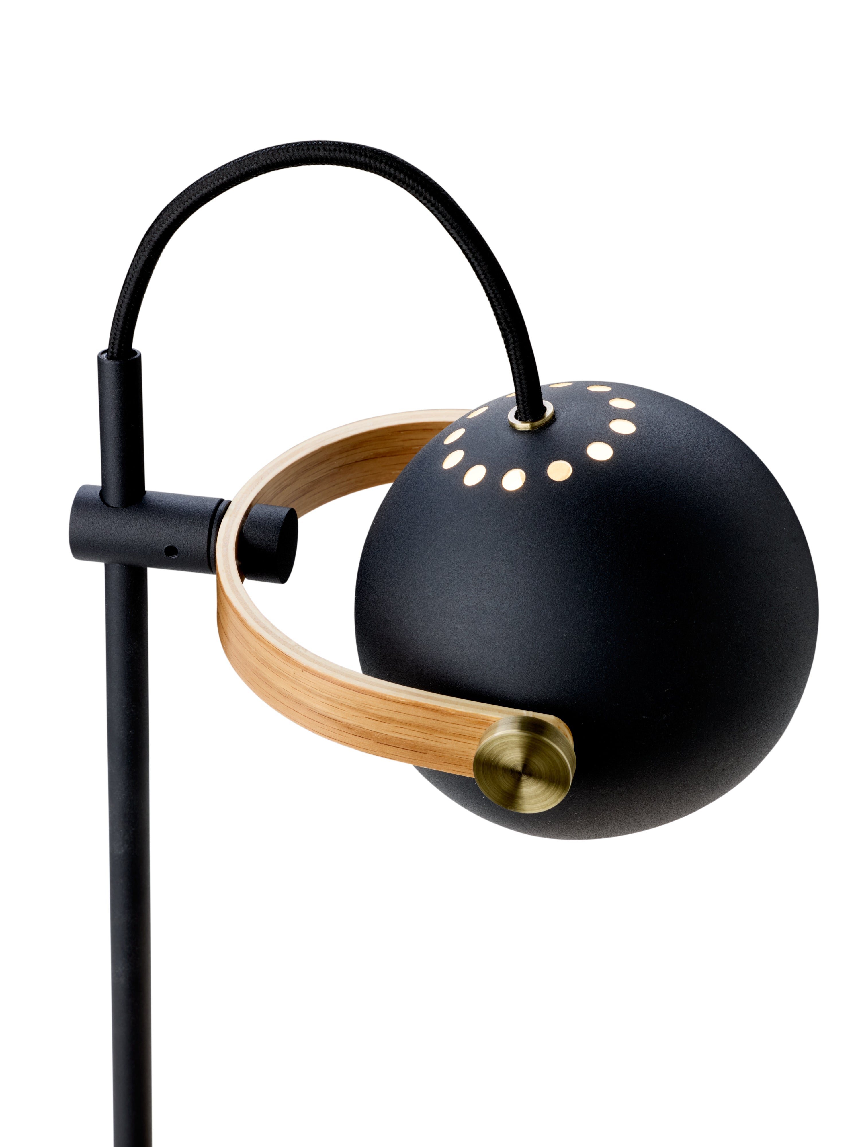 Zoomet ind på toppen af DC Portable Bordlampe i Sort