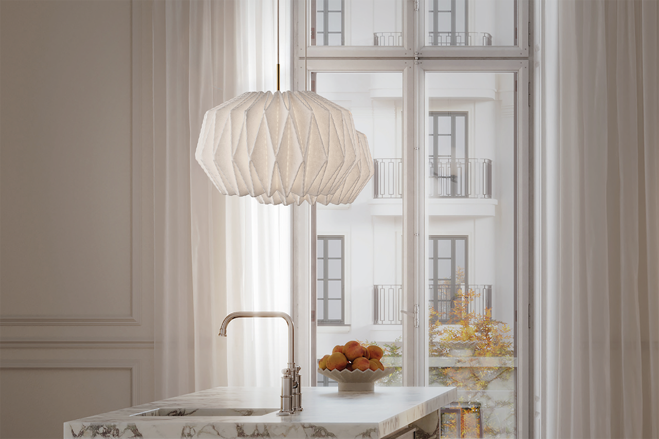 Le Klint 164 Softly Pleated 1 XL hængt op over køkkenøen for deres behagelige belysning