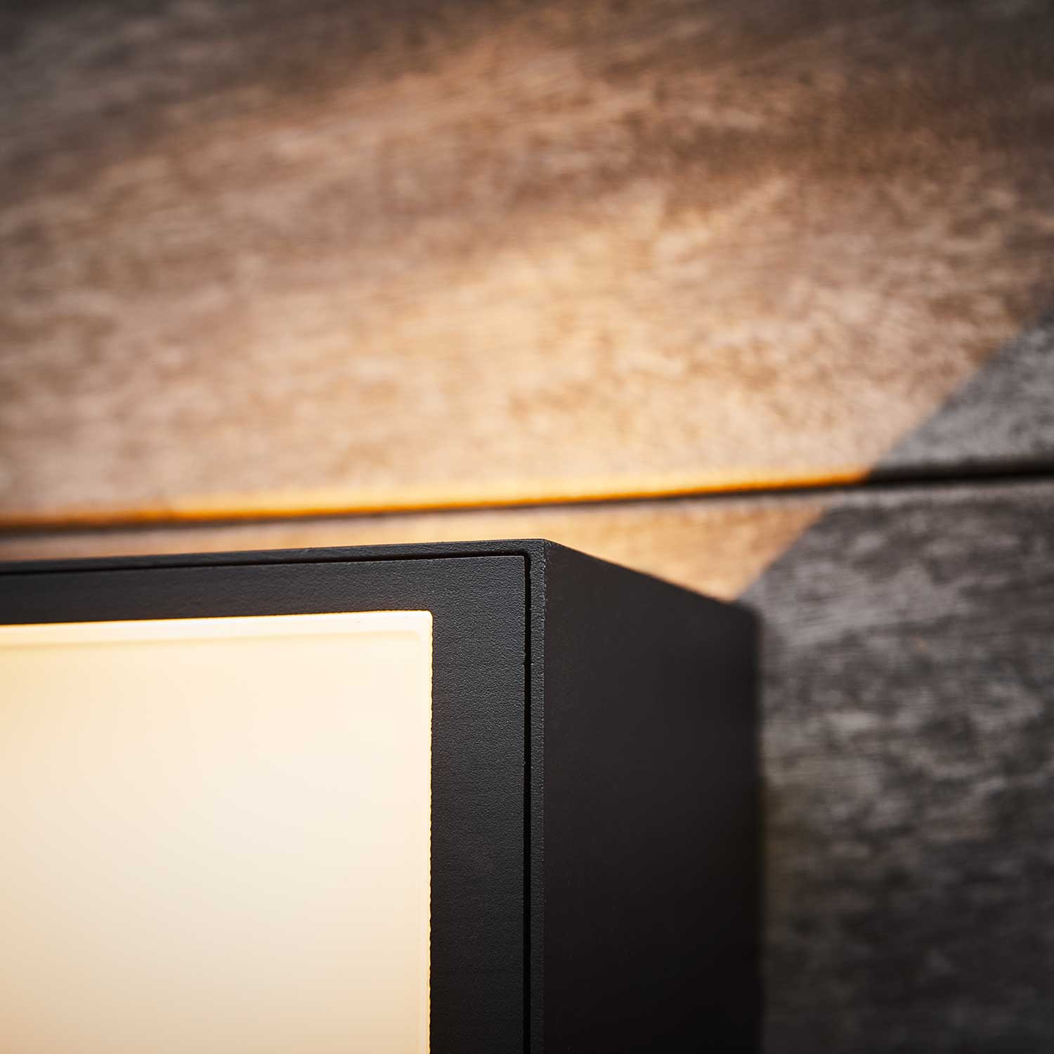 LOOM Design Una sort IP54 væglampe