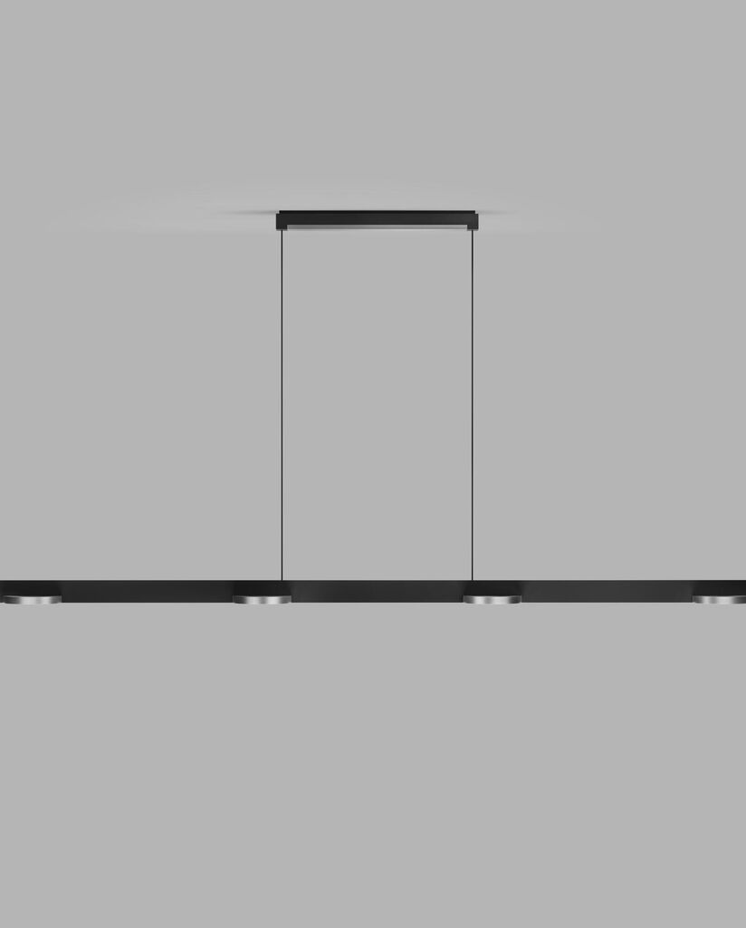 Den unikke Inlay S1800 Linear Disc SwitchTune 2700-3000K i Mat Sort/Satin Sølv hængt op foran en væg for en flot kontrast