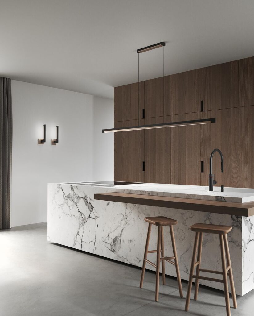 Et par Light-Point Inlay W2 Linear matsort satinguld LED væglampe af Studio F. A. Porsche i køkkenet