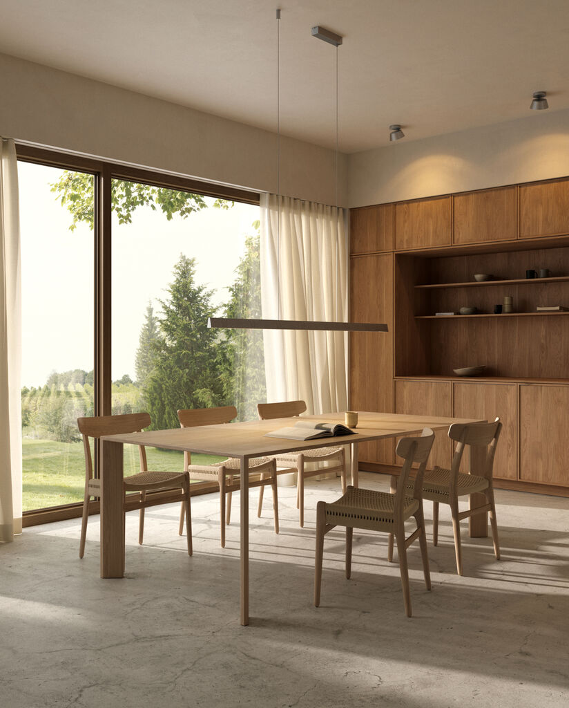 Edge Linear S1500 2700/3000K LED Switch Tune Titanium i stuen over spisebordet i morgensolen