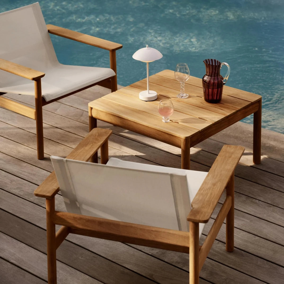 Fritz Hansen Clam-Muslingi hvid på hav..terrassen?